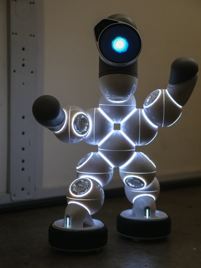 A futuristic humanoid robot with illuminated joints showcasing advanced technology.